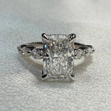 Radiant Cut Diamond Ring with Marquise Accent Band
